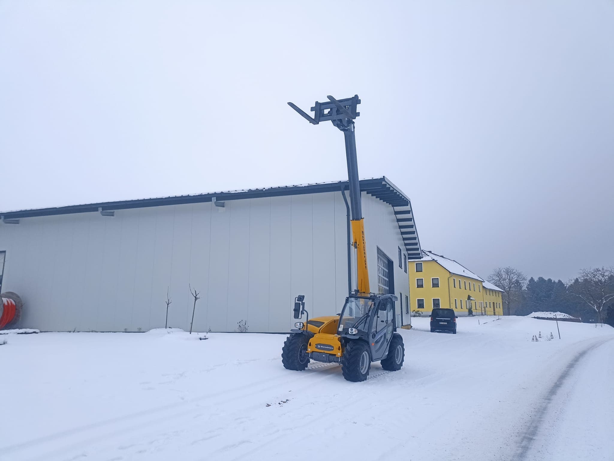 Eurotrac TH25.6 VorfĂŒhrer mit Schaufel und Palettengabel â Bild 7